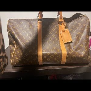 Luis Vuitton duffle travel bag